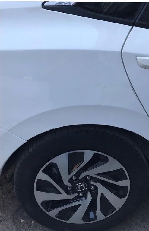 After – door panel aligned, repainted & sealed