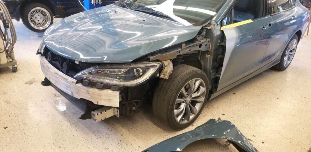 Before – rear bumper crack & scuffs